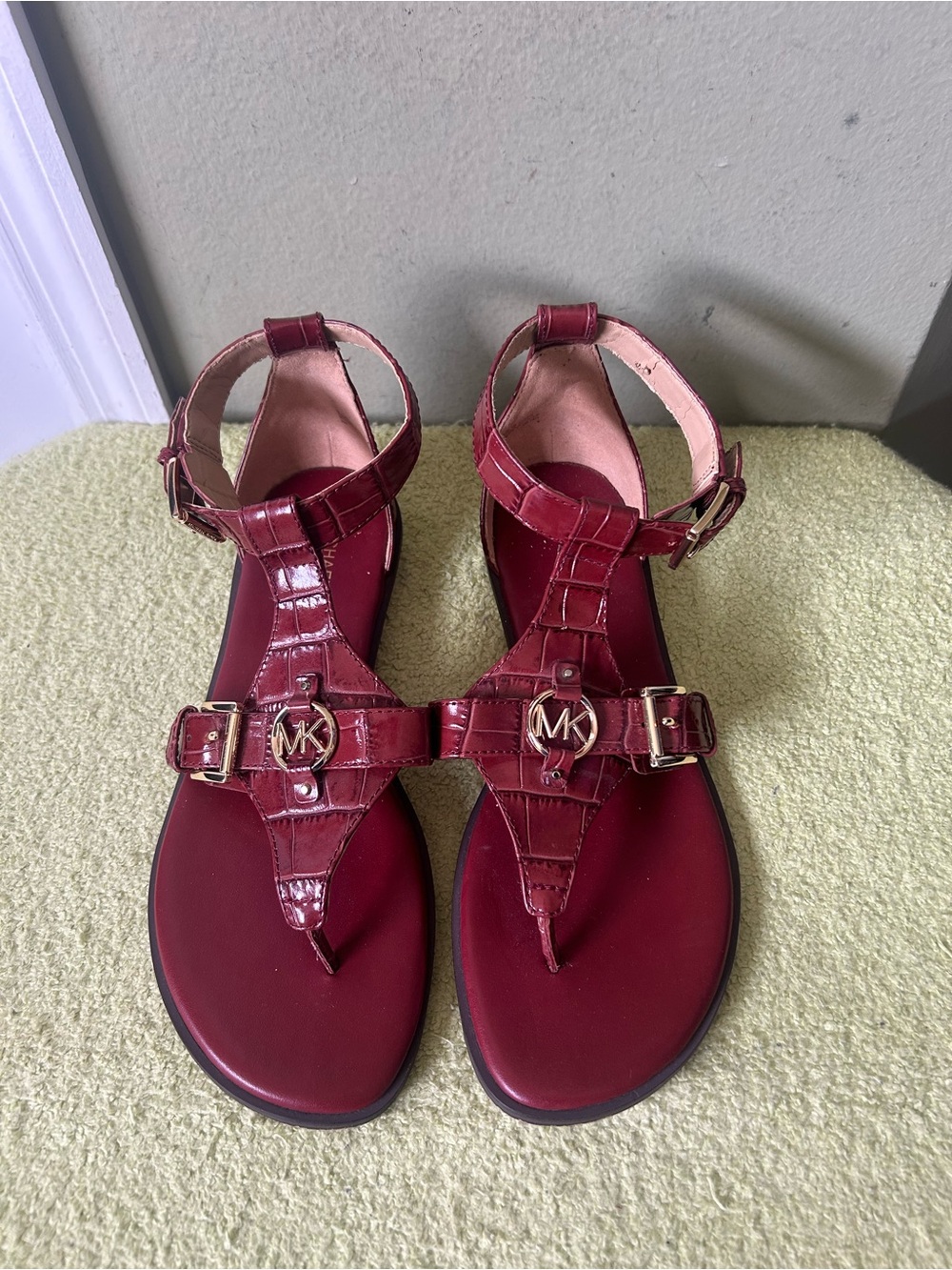 Michael Kors Burgundy Croc-Embossed T-Strap Sandals with MK Medallion